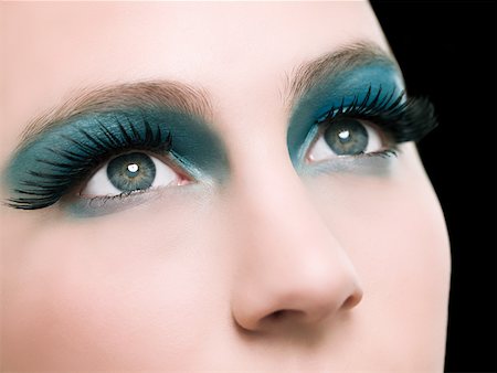 eye shadow - A young woman wearing false eyelashes Stock Photo - Premium Royalty-Free, Code: 614-02343538