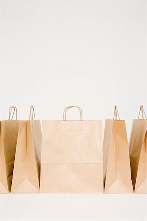 simsearch:614-02392370,k - Five paper bags in a row Foto de stock - Sin royalties Premium, Código: 614-02392372