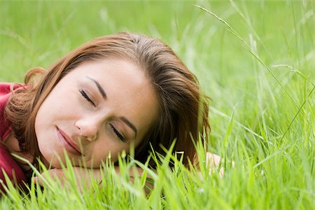 sleeping backyard - Woman sleeping on grass Stock Photo - Premium Royalty-Free, Code: 614-02392885