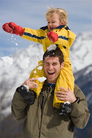 Boy on fathers shoulders Stock Photo - Premium Royalty-Free, Code: 614-02393421