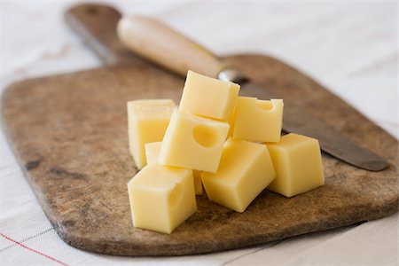 stack of cheese - Cubed cheese Stock Photo - Premium Royalty-Free, Code: 614-02393807