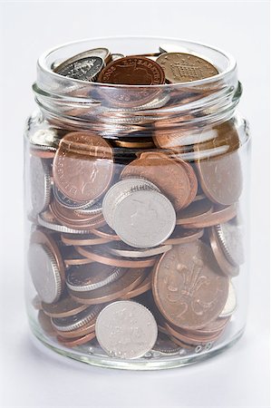 Jar of coins Foto de stock - Royalty Free Premium, Número: 614-02393838