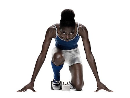 sprinteur - Jeune femme à starting blocks Photographie de stock - Premium Libres de Droits, Code: 614-02612709