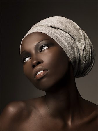 Young woman wearing headdress Stock Photo - Premium Royalty-Free, Code: 614-02613070