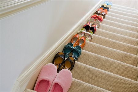 row shoes - Shoes on staircase Stock Photo - Premium Royalty-Free, Code: 614-02613111