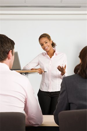 A lecturer teaching business students Stock Photo - Premium Royalty-Free, Code: 614-02613282