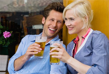 people drinking beer smiling - Couple with beer Stock Photo - Premium Royalty-Free, Code: 614-02613297