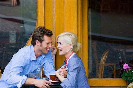 Couple at cafe Stock Photo - Premium Royalty-Free, Code: 614-02613320