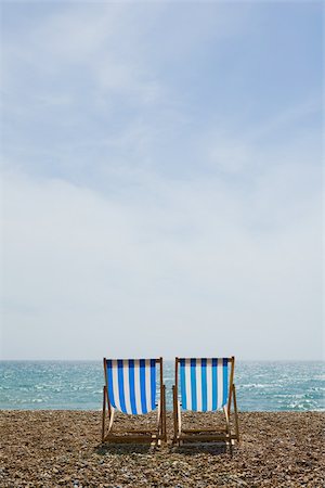 england brighton not people not london not scotland not wales not northern ireland not ireland - Deckchairs on brighton beach Stock Photo - Premium Royalty-Free, Code: 614-02613525