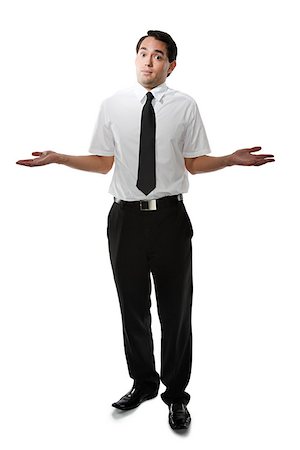 Young man shrugging Stock Photo - Premium Royalty-Free, Code: 614-02613889