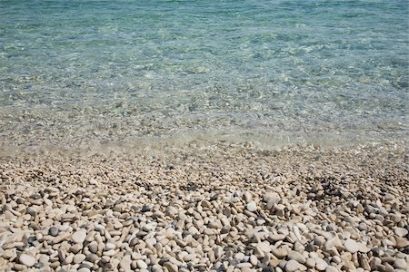 Pebble beach and sea Stock Photo - Premium Royalty-Free, Code: 614-02613933