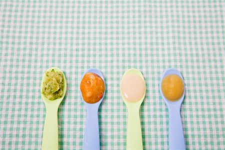 spoon line - Baby food on spoons Stock Photo - Premium Royalty-Free, Code: 614-02639857