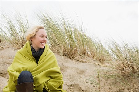 Woman at the coast in blanket Stock Photo - Premium Royalty-Free, Code: 614-02640012