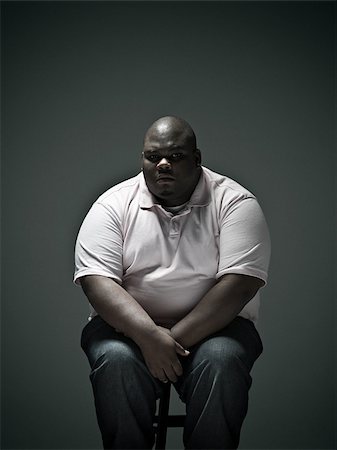 real people studio serious - Overweight man Stock Photo - Premium Royalty-Free, Code: 614-02640122