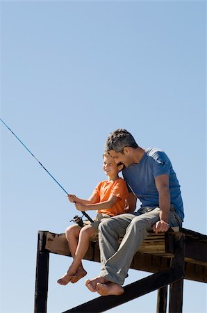 father and son and fishing - Father and son fishing Stock Photo - Premium Royalty-Free, Code: 614-02640455