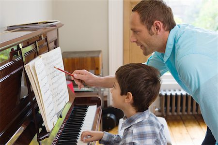 simsearch:614-02640837,k - Father teaching son how to play the piano Stock Photo - Premium Royalty-Free, Code: 614-02640817