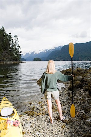 Woman with kayak Stock Photo - Premium Royalty-Free, Code: 614-02679024