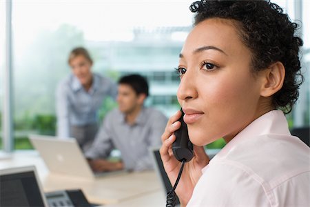 simsearch:614-02680155,k - Office worker on telephone Stock Photo - Premium Royalty-Free, Code: 614-02679062
