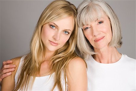 pretty gray hair smiling - Young woman and senior woman Stock Photo - Premium Royalty-Free, Code: 614-02680399