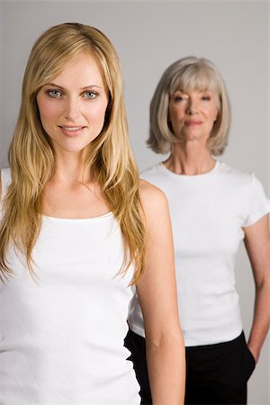 pretty gray hair smiling - Young woman and senior woman Stock Photo - Premium Royalty-Free, Code: 614-02680409