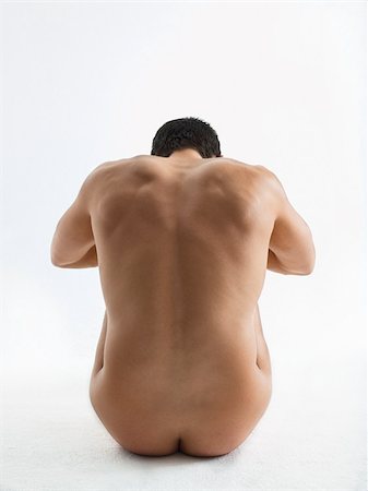 rivelare - Nude man sitting Fotografie stock - Premium Royalty-Free, Codice: 614-02739488