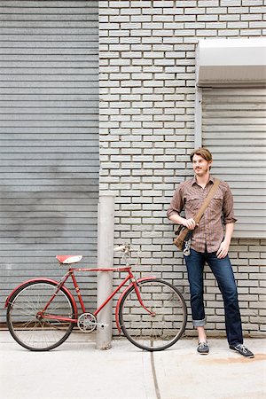 Man with bicycle Stock Photo - Premium Royalty-Free, Code: 614-02739781