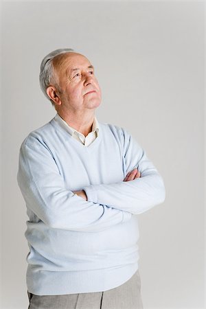 senior man introspective - Senior man looking up Stock Photo - Premium Royalty-Free, Code: 614-02739909