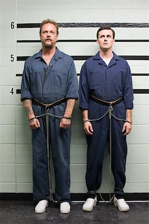 simsearch:614-02739996,k - Prisoners on line up Foto de stock - Royalty Free Premium, Número: 614-02739992