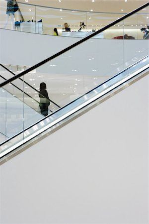 department store inside - People on escalator Stock Photo - Premium Royalty-Free, Code: 614-02740053