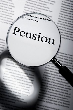 financial highlights - Word pension under magnifying glass Stock Photo - Premium Royalty-Free, Code: 614-02740315