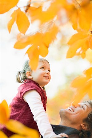 Father and daughter in park Stock Photo - Premium Royalty-Free, Code: 614-02740345