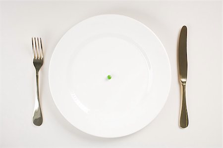 pea - A pea on a plate Stock Photo - Premium Royalty-Free, Code: 614-02740448