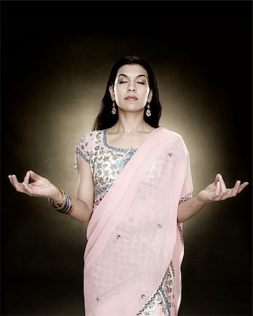 A hindu woman meditating Foto de stock - Sin royalties Premium, Código: 614-02764099