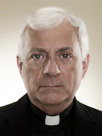 priest - A headshot of a priest Stock Photo - Premium Royalty-Free, Code: 614-02764108