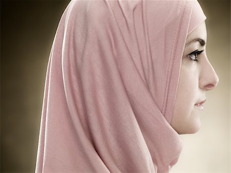 Profile of a young muslim woman Stock Photo - Premium Royalty-Free, Code: 614-02764117