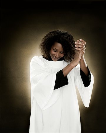 A gospel singer clapping Stock Photo - Premium Royalty-Free, Code: 614-02764119
