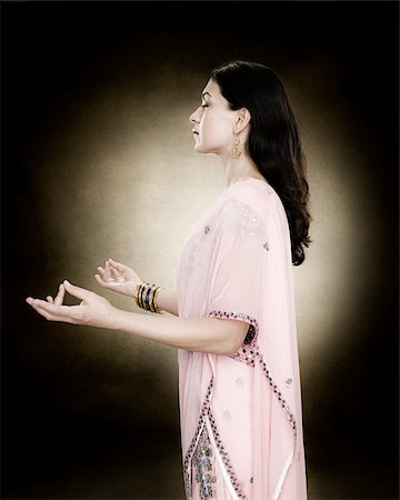 A hindu woman meditating Stock Photo - Premium Royalty-Free, Code: 614-02764132