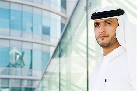 dubai mans - Portrait of a middle eastern businessman Stock Photo - Premium Royalty-Free, Code: 614-02764304