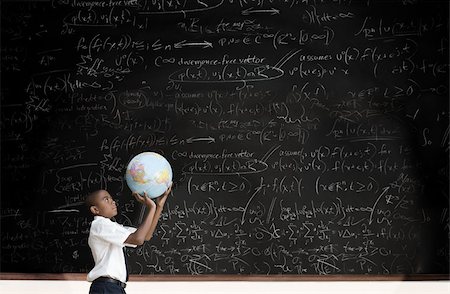 pictures of african american high school students - Boy with globe in front of blackboard Stock Photo - Premium Royalty-Free, Code: 614-02762786