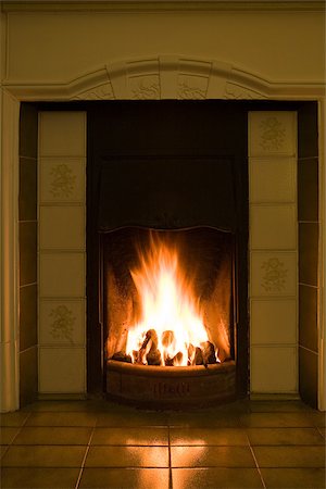 fire (things burning controlled) - A fireplace Stock Photo - Premium Royalty-Free, Code: 614-02763172