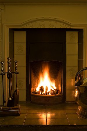 fireplace - A fireplace Stock Photo - Premium Royalty-Free, Code: 614-02763173