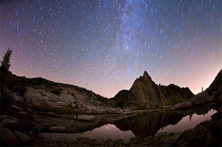 fish eye view - Prusik peak gnome tarn and stars in sky Stock Photo - Premium Royalty-Free, Code: 614-02763239