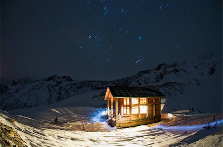 snowy cabin pictures - A hut at night Stock Photo - Premium Royalty-Free, Code: 614-02763271