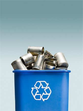 Tin cans in a recycling bin Stock Photo - Premium Royalty-Free, Code: 614-02763786