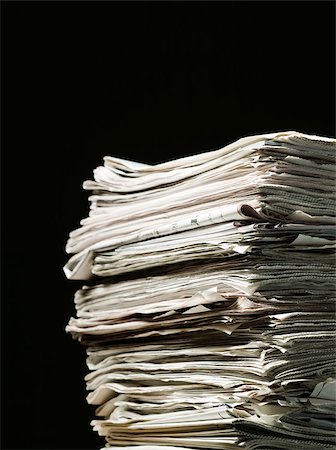 paper recycling studio photos - Stack of newspapers Stock Photo - Premium Royalty-Free, Code: 614-02763813