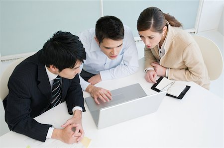 simsearch:859-06711009,k - Businesspeople in a meeting Stock Photo - Premium Royalty-Free, Code: 614-02838223