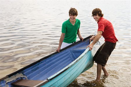 Friends with rowboat Stock Photo - Premium Royalty-Free, Code: 614-02838524