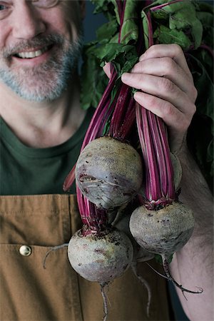 Man with beetroot Stock Photo - Premium Royalty-Free, Code: 614-02838732