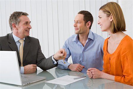 female real estate agent - Business meeting Stock Photo - Premium Royalty-Free, Code: 614-02934201