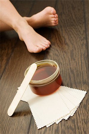 Leg waxing Stock Photo - Premium Royalty-Free, Code: 614-02934497